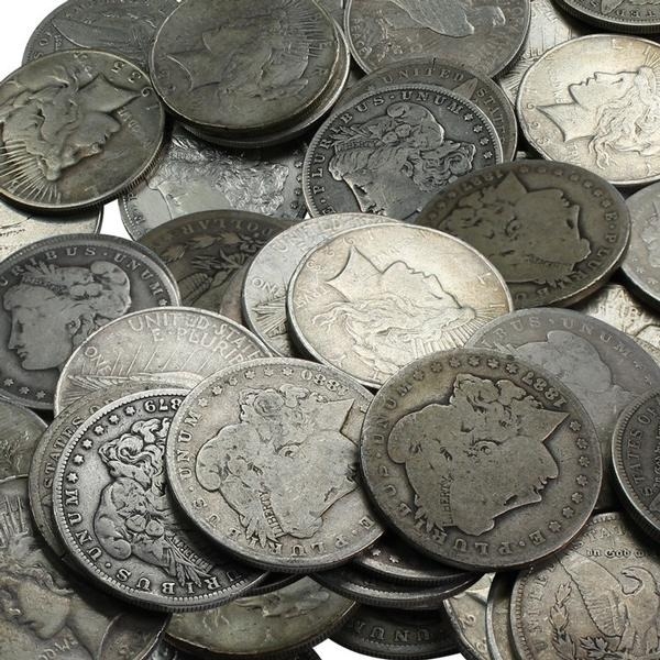Numismatic rare coins in a pile at Denver and Aurora numismatist buyer